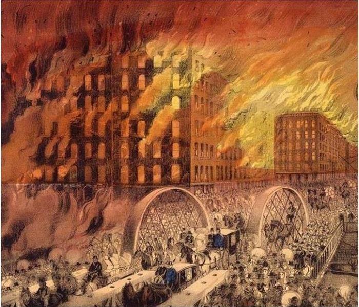 Drawing of town up in orange, red, yellow flames